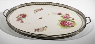 a tray with flowers on it sitting on a table