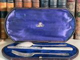 a purple case with silverware in it on a table
