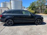 an image of a black audi suv parked in a parking lot