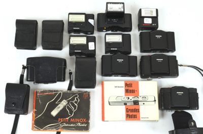 a lot of electronic devices that are sitting on a table