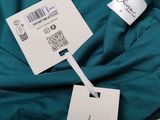 a close up of a bag with a tag on it