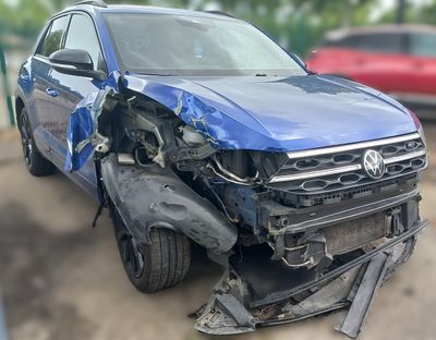 a picture of a car that has been badly damaged