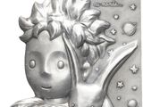 a metal plaque with a picture of a little girl on a horse
