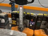 a picture of a forklift in a warehouse with other tools