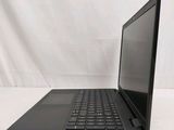 the back of a laptop computer sitting on top of a white table