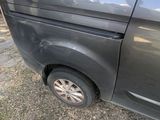 a black van parked on the side of the road