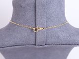 a close up of a mannequin with a gold chain on it