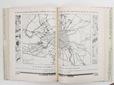 an open book with a map of a city on it
