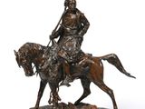 statue of a man riding a horse with a spear on his head