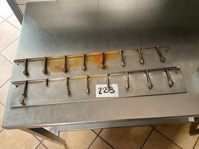 a metal table with a bunch of tools on top of it