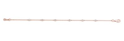 a white gold bracelet with diamonds on a white background