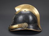 a close up of a helmet on a black surface