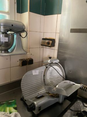 an image of a kitchen with a mixer and other appliances