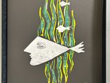 painting of a person holding a piece of paper with a fish on it