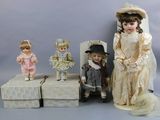 a group of dolls that are sitting next to each other