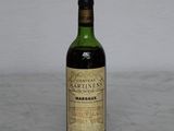 a bottle of wine that is sitting on a table