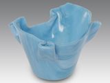 a blue bowl that is sitting on a table
