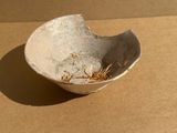 a small bowl that is sitting on a table
