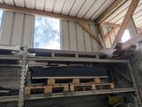 a room with a lot of wooden pallets in it