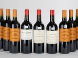 six bouteilles de vin rouge alignées sur une surface blanche