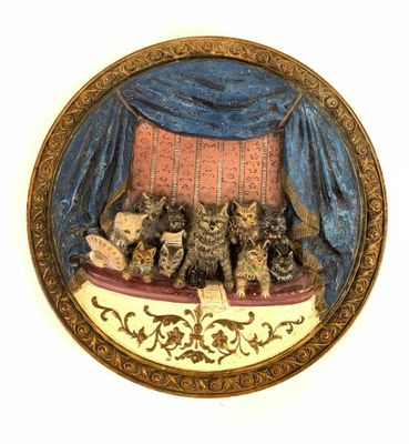 a picture of a picture of a group of cats on a bed