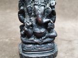 an image of a statue of an elephant sitting on top of a table