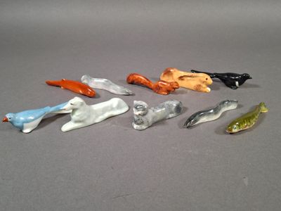 LIMOGES. Suite de 10 porte-couteaux en porcelaine polychrome…