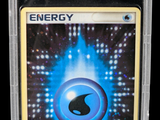 a close up of a card in a plastic case on a black background