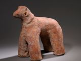 an image of a sculpture of a bear on a grey background