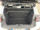 the back of a car with its trunk open and the back of the car in the back