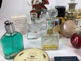 many different types of perfumes on the table