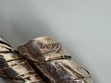 a silver object that is sitting on a table