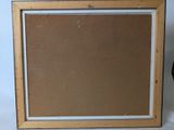 an image of a picture frame with a brown background and a white border