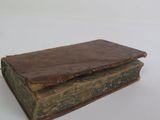 a small wooden box that is sitting on a table