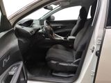 the interior of a car with the door open and the driver ' s seat down