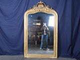 a man taking a picture of himself in a mirror