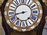 a clock that is sitting on top of a table