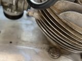 a close up of a motorcycle engine on a table