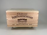 a close up of a wooden box with a label on it