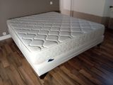 a mattress that is sitting on the floor in the room