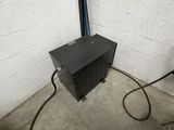 an image of a black electrical box in a garage