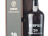 a bottle of koppke 20 years old bottled with a wooden box