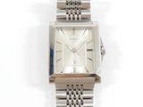 an image of a close up of a wrist watch on a white surface