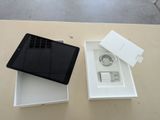 a tablet that is sitting in a box on a table