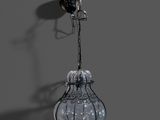 a black and white photo of a light hanging from a ceiling