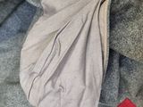 a bag that is sitting on top of a bed