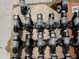 a lot of different types of valves on the floor