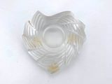 a white object that is sitting on a white surface