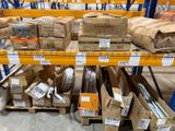 many boxes on the shelves in the warehouse
