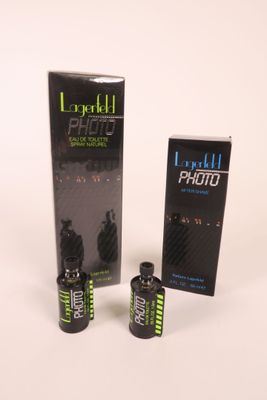 two bottles of liquid sitting next to each other on a white surface